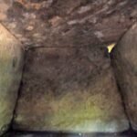 Moss-covered stone walls inside Dolmen Tenderness