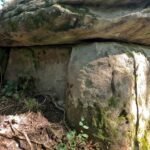 Side view of Dolmen Tenderness in forest
